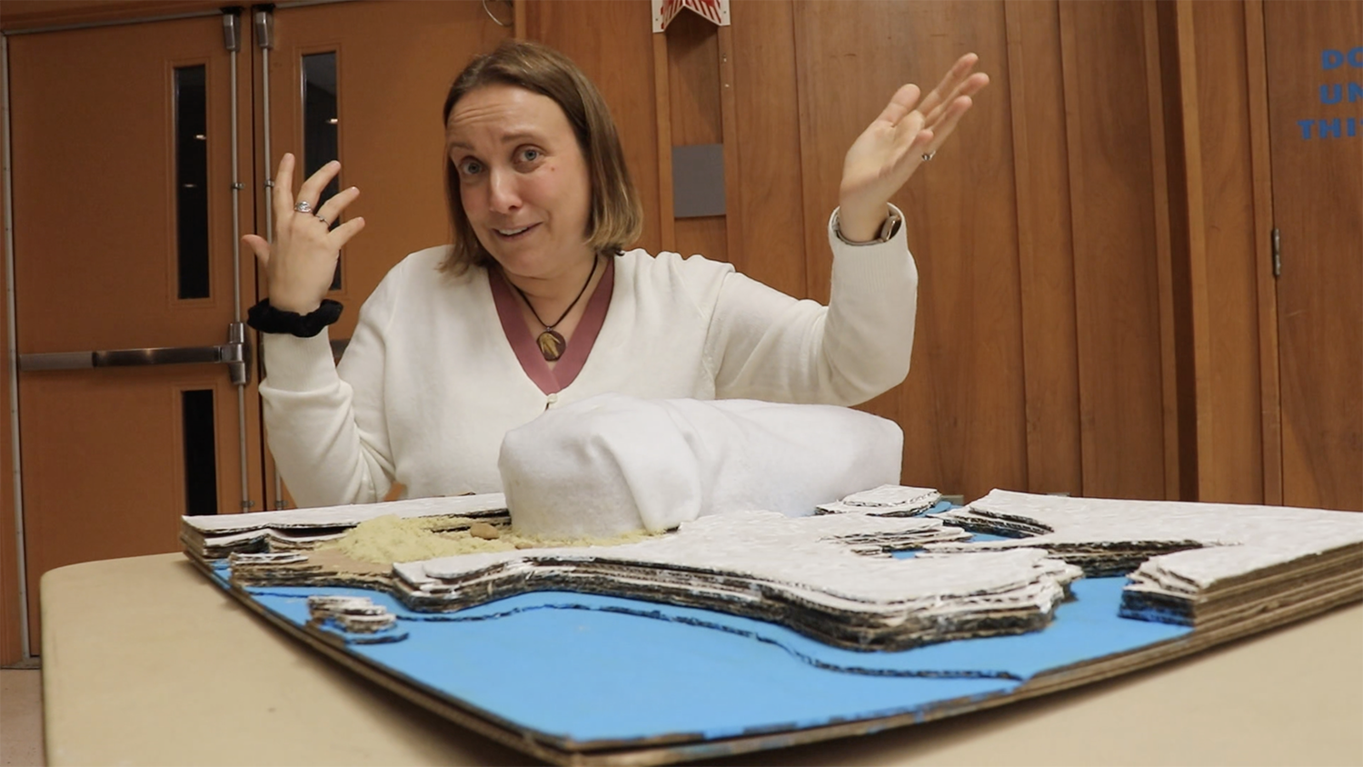 Geoscientist Catrina Russell-Dolan prepares a model which represents glacial advance and retreat for her presentation on art and geology on Sunday, Feb. 9, 2025, at the Nova Scotia Museum of Natural History in Halifax.